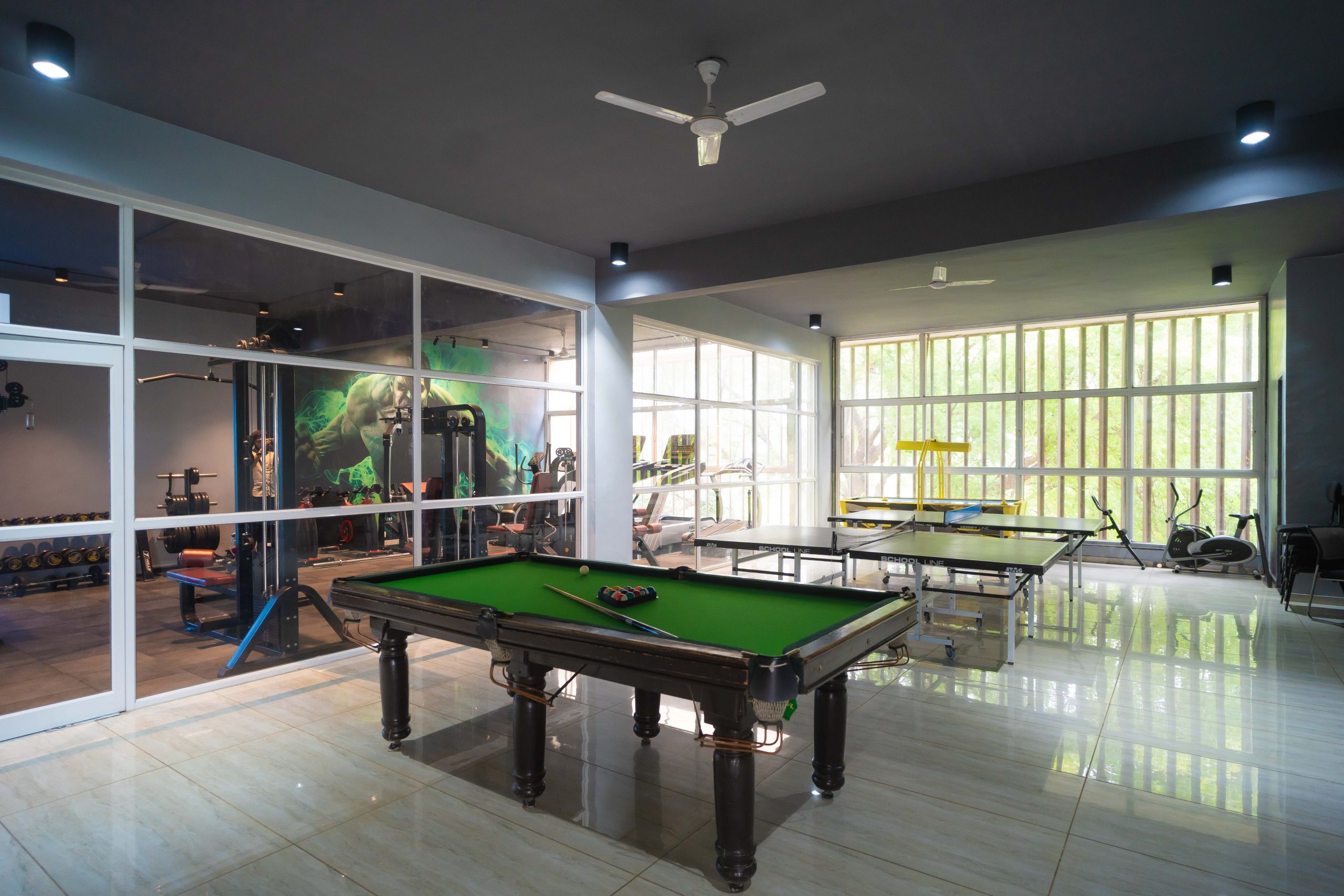 An image depicting the indoor sports facilities at NBS, illustrating various sports amenities available for student activities and physical education.